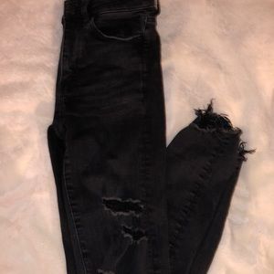 black ripped american eagle jeans
